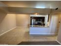 Open concept view showing kitchen with stainless steel appliances and spacious living area at 10136 E Southern Ave # 3109, Mesa, AZ 85209