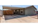 Spacious covered carport with a privacy fence and access to the home at 10951 N 91St Ave # 84, Peoria, AZ 85345