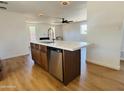 Beautiful kitchen island featuring stainless steel appliances and modern countertops, perfect for entertaining at 2201 N 29Th Pl, Phoenix, AZ 85008