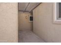 Exterior patio features a concrete surface with a sun shade at 3345 E University Dr # 2, Mesa, AZ 85213