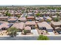 Desirable community featuring well-maintained homes and mature landscaping at 45647 W Starlight Dr, Maricopa, AZ 85139