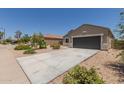 Charming single-story home featuring low-maintenance desert landscaping and a spacious two-car garage at 11303 E Sunflower Ct, Florence, AZ 85132