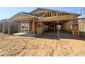 Image of a house in the construction phase with wooden framing and a concrete foundation at 15752 W Camden Ave, Waddell, AZ 85355