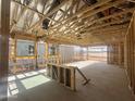 Interior view showcases exposed wood framing, and the infrastructure during construction at 15752 W Camden Ave, Waddell, AZ 85355