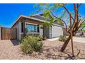 Charming single-Gathering home with a well-maintained front yard and two car garage at 5709 S 13Th Ave, Phoenix, AZ 85041