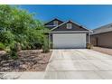 Charming single-Gathering home with a well-maintained front yard and two car garage at 5709 S 13Th Ave, Phoenix, AZ 85041