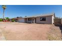 Cozy single-Gathering home with a garage, covered porch, and low-maintenance landscaping at 5807 W Encanto Blvd, Phoenix, AZ 85035