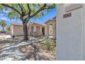 Street view of desert homes showing sidewalks and stone landscaping at 9261 W Sheridan St, Phoenix, AZ 85037