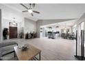 Bright, open-concept living area with vaulted ceilings and modern flooring at 11446 N 109Th St, Scottsdale, AZ 85259