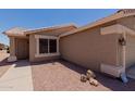 Low maintenance desert landscaping in front of this single Gathering home at 1341 E Bellerive Dr, Chandler, AZ 85249