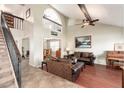 Spacious living room with high ceilings, hardwood floors, and beautiful architectural details at 14622 N 45Th Pl, Phoenix, AZ 85032