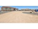 Spacious single-story home featuring desert landscaping and an extended circular driveway at 28156 N Edwards Rd, San Tan Valley, AZ 85143