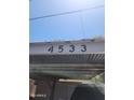 Image of the address 4533 affixed to an exterior carport or awning at 4533 N 17Th Ave, Phoenix, AZ 85015