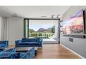 Comfortable living room leading to patio with pool and mountain views at 5301 N 43Rd St, Phoenix, AZ 85018