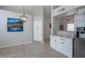 Kitchen featuring stainless steel appliances, granite countertops, and eat in nook at 839 W Silver Creek Rd, Gilbert, AZ 85233