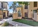 Charming home exterior with manicured landscaping, entryway steps, and neutral color palette at 101 N 7Th St # 225, Phoenix, AZ 85034