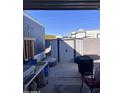 Enclosed patio with storage shed, offering private outdoor living space at 2600 E Allred Ave # R-88, Mesa, AZ 85204
