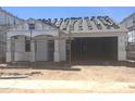 Exterior view of home under construction, showcasing the roof tiles and frame at 805 W Lark Dr # 243, Queen Creek, AZ 85140