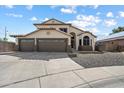 Charming two-story home with a spacious three-car garage and easy-care desert landscaping at 19002 N 25Th Pl, Phoenix, AZ 85050