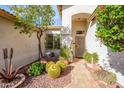 Inviting front entrance with decorative cacti and a welcoming pathway at 316 W Anderson Ave, Phoenix, AZ 85023