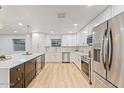 Beautiful kitchen boasting stainless steel appliances, bright lighting, and stylish countertops at 3506 W Yucca St, Phoenix, AZ 85029