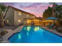 Sparkling pool with lounge chairs and a patio, perfect for outdoor relaxation and entertaining at 5930 E Fountain St, Mesa, AZ 85205