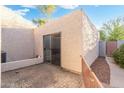 Enclosed patio area with sliding glass doors, offering a private outdoor space with easy indoor-outdoor flow at 1913 S River Dr, Tempe, AZ 85281