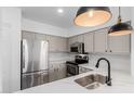Well-lit kitchen boasts stainless steel appliances, ample counter space, and undermount sink at 20100 N 78Th Pl # 2114, Scottsdale, AZ 85255