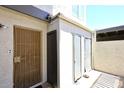 View of the front entrance with a security door and multiple storage units at 2416 W Caribbean Ln # 2, Phoenix, AZ 85023