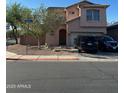 Charming two-story home featuring a light brown stucco exterior and a two car garage at 9904 E Elena Ave, Mesa, AZ 85208