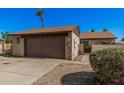 Single Gathering home with a 2-car garage and desert landscaping for low maintenance at 5101 W Purdue Ave, Glendale, AZ 85302