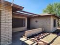 Inviting front entrance with decorative features and a covered porch area, leading to the front door at 11216 N 52Nd Ave, Glendale, AZ 85304