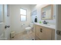 Bathroom with neutral walls and modern vanity at 2361 N 212Th Dr, Buckeye, AZ 85396