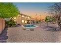Outdoor pool with rock landscaping and backyard views at 20277 N 68Th Dr, Glendale, AZ 85308