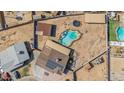Aerial view of home with pool, backyard, and ample space for outdoor activities and entertaining at 2319 N 71St Dr, Phoenix, AZ 85035