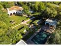 Aerial view of a beautiful home, showcasing the pool, manicured grounds, and landscaping at 5225 N 23Rd St, Phoenix, AZ 85016