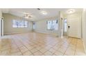 Spacious living room with vaulted ceiling, tile flooring, and plenty of natural light at 1048 N Arroya --, Mesa, AZ 85205