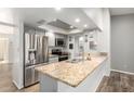 Bright kitchen features stainless steel appliances and stunning granite countertops at 2059 E Brown Rd # 35, Mesa, AZ 85213