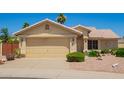 Charming single story home with a well-maintained front yard featuring desert landscaping at 2409 S Chestnut Pl, Chandler, AZ 85286