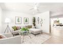 Open living area with stylish decor, neutral furniture, and lots of natural light at 3118 W Windrose Dr, Phoenix, AZ 85029