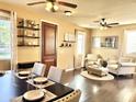 Inviting dining area featuring stylish decor, elegant furniture, and hardwood floors at 4332 E Oakland St, Gilbert, AZ 85295