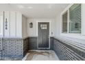 Close-up of the home's front entrance and stylish door at 1066 E 7Th Pl, Mesa, AZ 85203