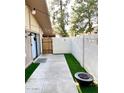 Cozy patio with an outdoor fire pit and string lights at 1550 N Stapley Dr # 95, Mesa, AZ 85203