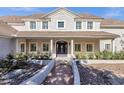 Attractive home exterior with a welcoming front entrance and manicured garden at 856 W Quail Cir, San Tan Valley, AZ 85143