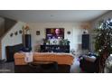 Cozy living room with large screen television, cabinets, and lamps at 1309 W Park St, Phoenix, AZ 85041