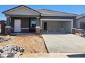 New construction home featuring a spacious two-car garage and modern design at 4253 E Kolin Ln, San Tan Valley, AZ 85143