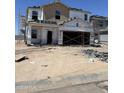 New home under construction with exposed framework and building materials at 5992 E Artemis Dr, Florence, AZ 85132