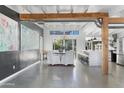 Bright open floor plan with modern dining and kitchen at 7030 E Orange Blossom Ln, Paradise Valley, AZ 85253