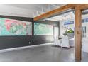 Open-concept dining room with large windows and stylish decor at 7030 E Orange Blossom Ln, Paradise Valley, AZ 85253