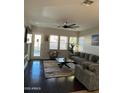 Bright living room features lots of natural light, comfortable seating, and modern décor at 8820 W Glenn Dr, Glendale, AZ 85305